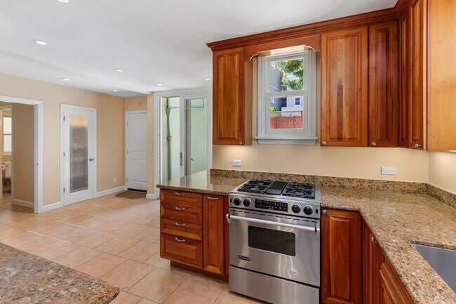 Building Photo - Forest Hill: Bright Updated Single Family Home with Garage, Backyard & Storage