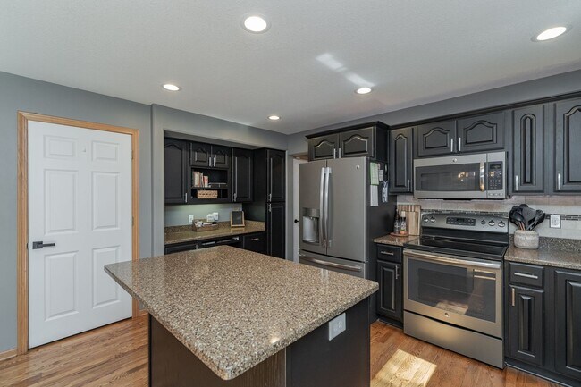 Building Photo - Spacious Home With Finished Basement And 3 Car Garage