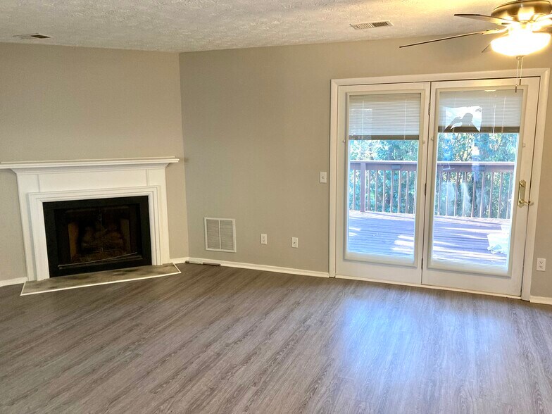 Step outside to the deck form living room - 1502 Queen Anne Ct