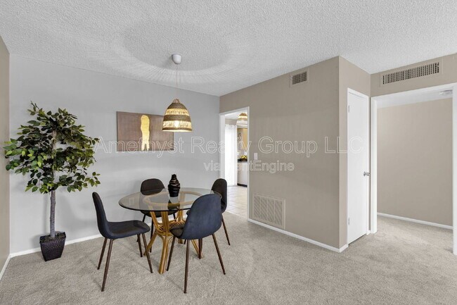 Building Photo - 10547 W Coggins Dr