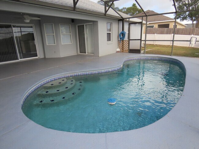 Building Photo - Spacious 4 Bedroom Pool Home Plus Addition...