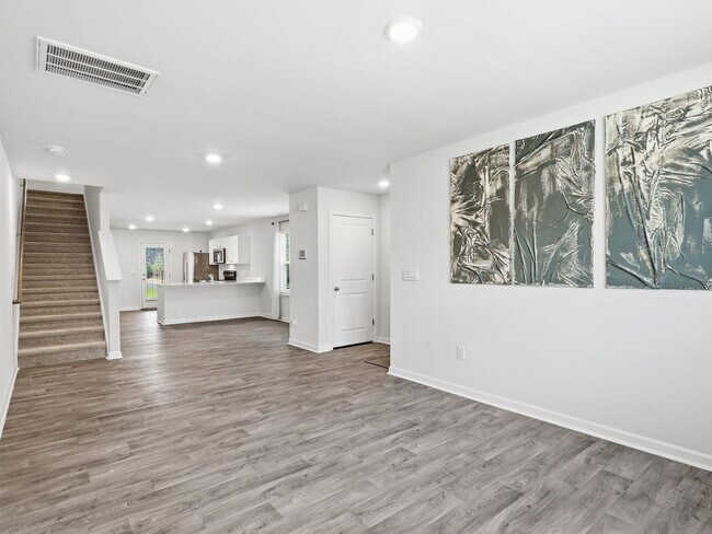 Building Photo - Newly Built 3BD, 2.5BA End Unit Raleigh Townhome with a Fenced Yard in a Prime Location