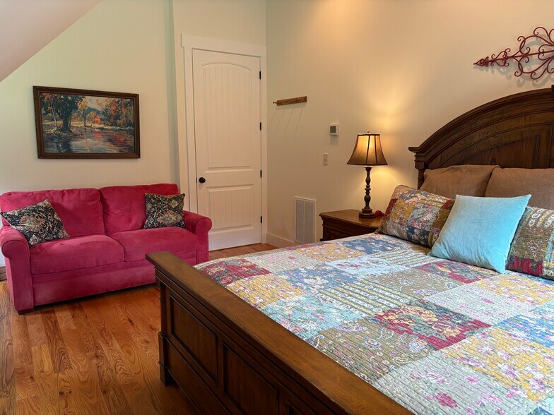 1st bedroom with King bed and sleeper sofa - 274 Little River Campground Rd