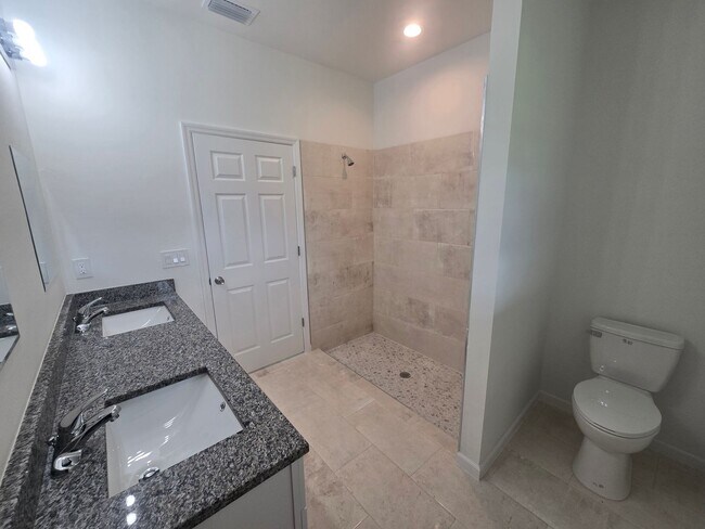 Building Photo - Brand New 3 BEDROOM 2 BATH AND ONE CAR GAR...