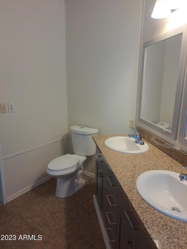 Building Photo - 7125 N 68th Dr