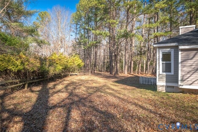 Building Photo - 5600 Woods Walk Rd