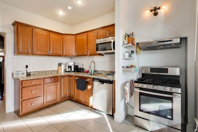 Building Photo - COMING SOON - Sprawling 5 Bed, 3 Bath, Two Kitchens, Dual Back Decks, Two Office/Den Townhouse, 2...