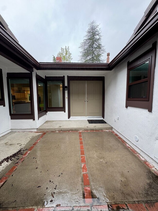 Building Photo - Renovated Home with Modern Comfort and Spa...