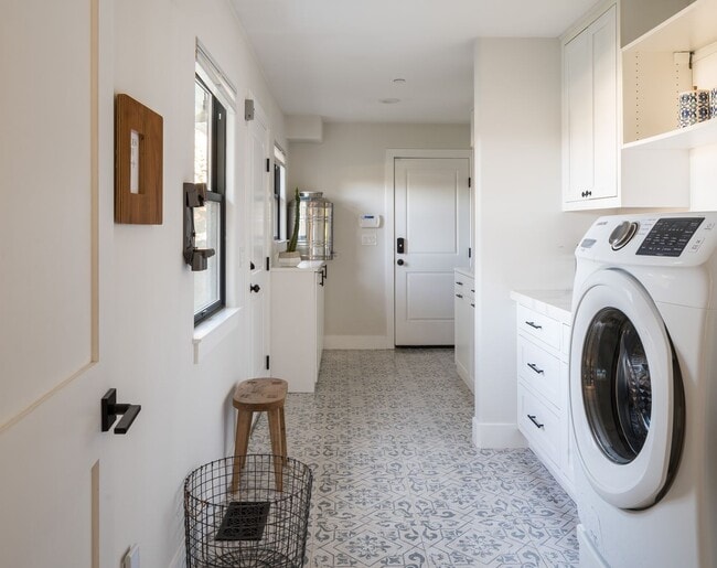 Building Photo - PURE Property Management Presents