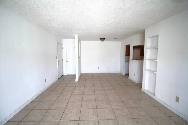 Building Photo - Spacious Vinyl-Sided 2BR Apartment with Open Layout, Private Patio, and Pet-Friendly Options – Av...
