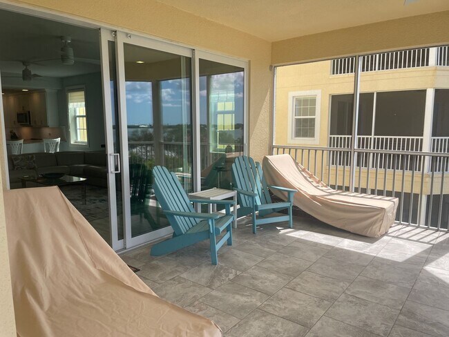 Building Photo - Coastal Luxury at Hidden Bay | 3BR Waterfront Condo with Bay Views