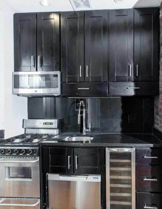 Building Photo - Renovated East Village 2-Bedroom with Skyl...