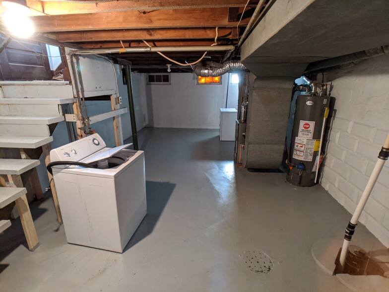 Recently sealed basement with washer and dryer in unit - 1315 S Norwood Ave