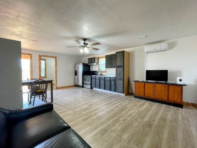Building Photo - Sunset-Side Mini Home – Your Cozy Retreat ...