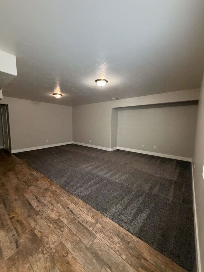 Building Photo - CALL TYE DIRECTLY 208-313-6062. 4 BED 2 BATH HOME WITH ATTACHED GARAGE