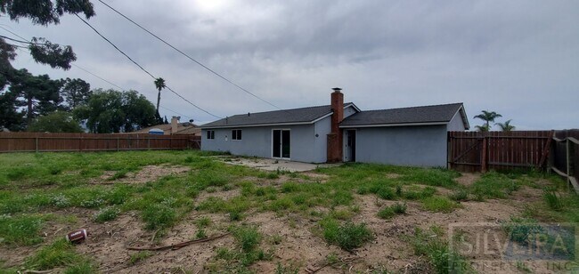 Building Photo - Four bedroom house available!