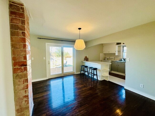 Building Photo - {8520} Charming Four Bedroom in Fantastic Location + Two Main Floor Bedrooms + Hardwood Floors + ...