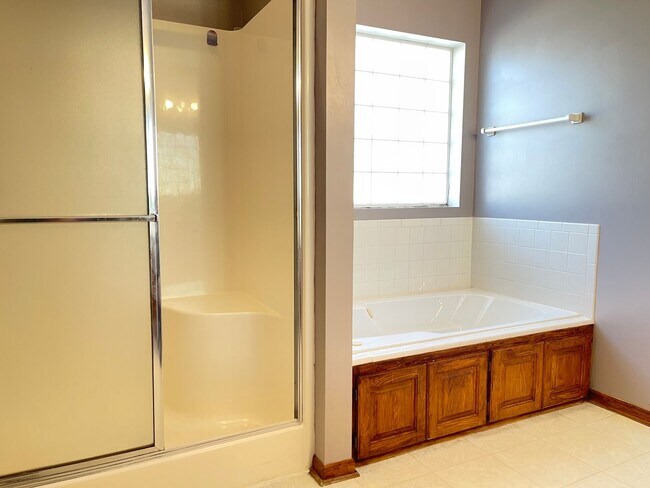 Building Photo - Northwest Omaha Gem: 2,700 Sq Ft, 3-Bedroom, Walk-Out Finished Basement, Fenced Yard, 3-Car Garag...