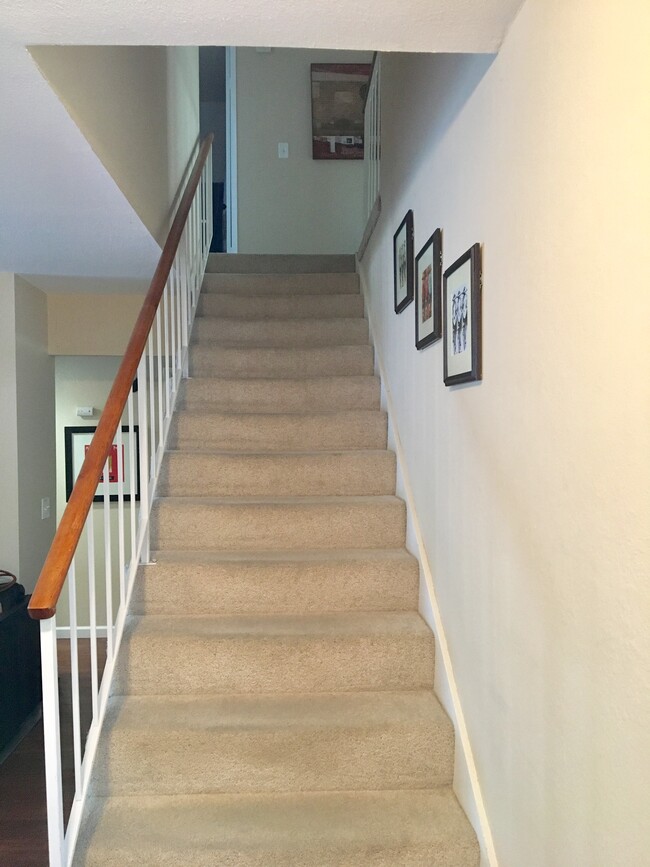 Stairway leading upstairs to the 3 bedrooms and 2 bathrooms. - 12967 Cree Ct