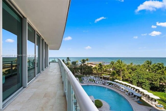 Building Photo - 10295 Collins Ave