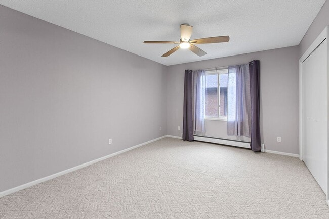 Building Photo - Spacious 2-Bedroom Condo with Garage and Basement