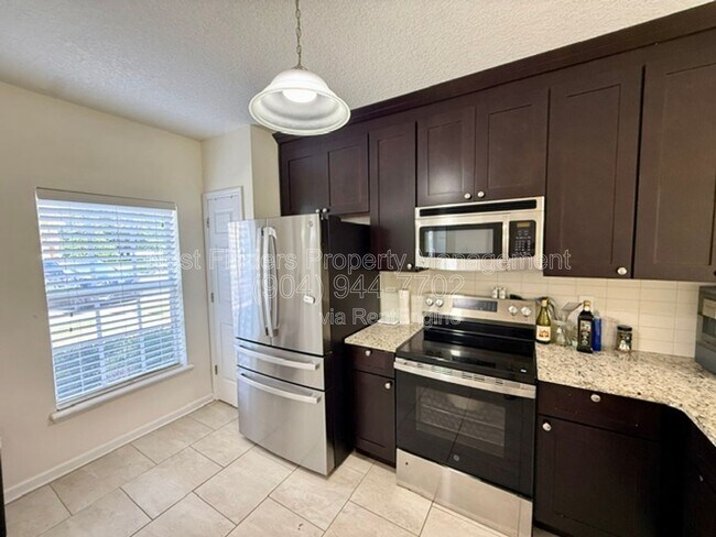 Building Photo - 12311 Kensington Lakes Dr