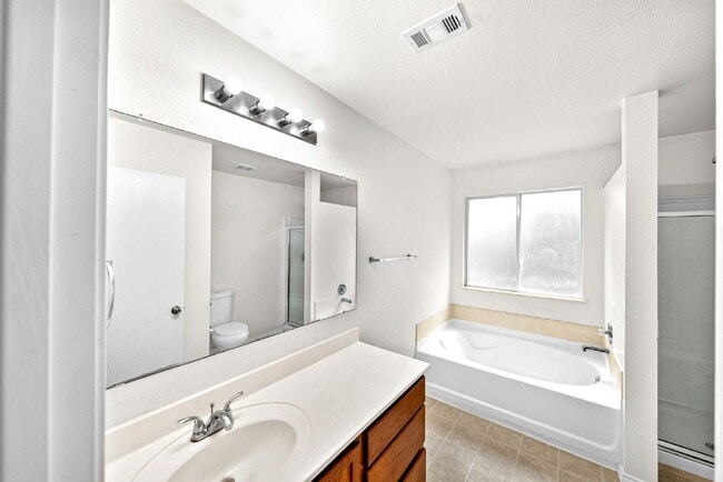 Building Photo - Charming 4-Bedroom Sanctuary - Spacious Living Awaits