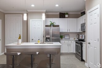 Building Photo - Spacious Floor Plans & Premium Amenities A...