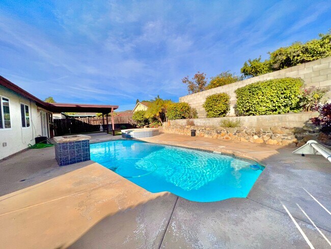 Building Photo - Beautiful 5 BD/2BA w/ Attached Garage & Sw...