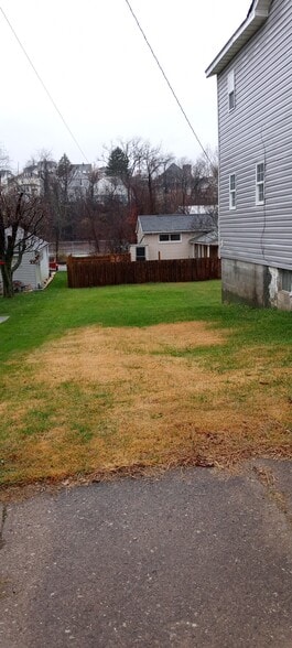 side yard - 108 S Depot St