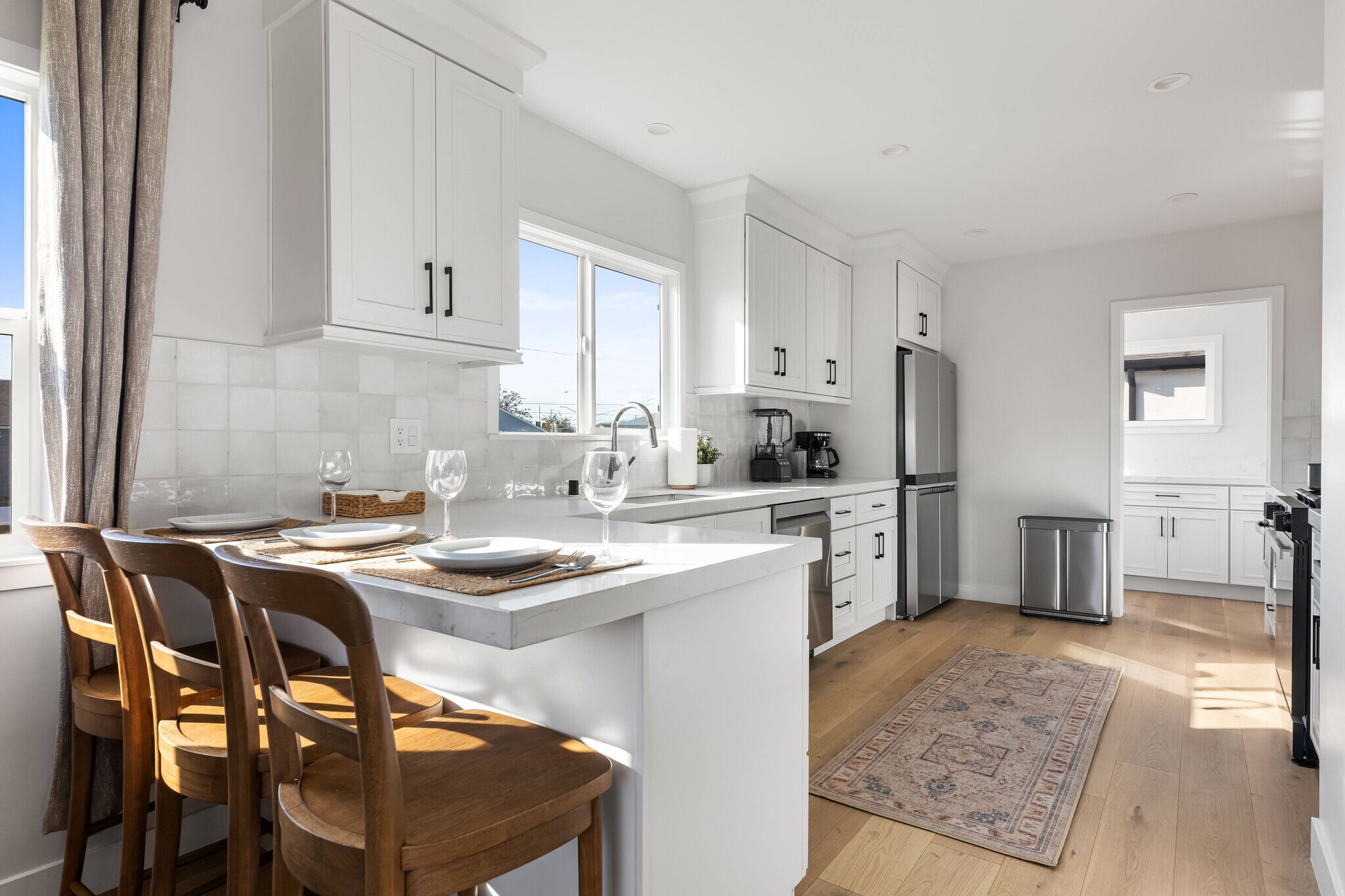 Kitchen with stainless steel appliances, natural sunlight, & all dishes & utensils/counter space (3) - 1823 N Ditman Ave