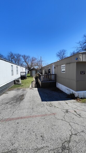 Front with parking spot. - 7905 Harwell St