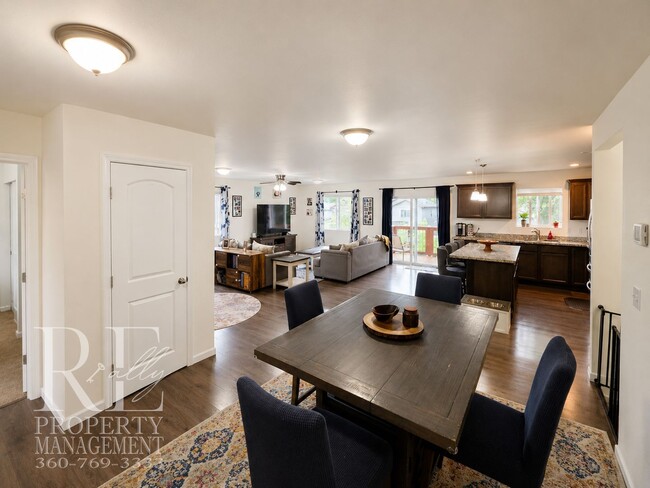 Building Photo - Spacious 3-Story Home with Flexible Living Space, Heat Pump & Private Deck Retreat