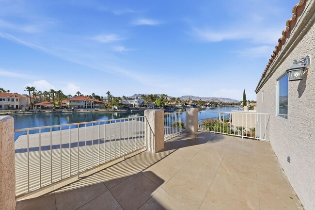 Building Photo - Luxury Lakefront Living in Desert Shores – 4 Bedroom Home with Private Dock & Stunning Views