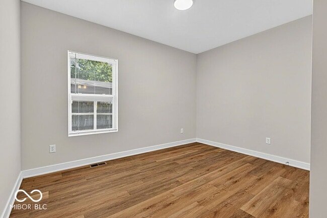 Building Photo - 4456 Caroline Ave