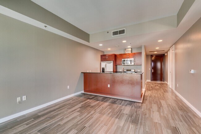 Building Photo - Iconic Strip-View Luxury | Elegant 1BR + Den High-Rise Residence