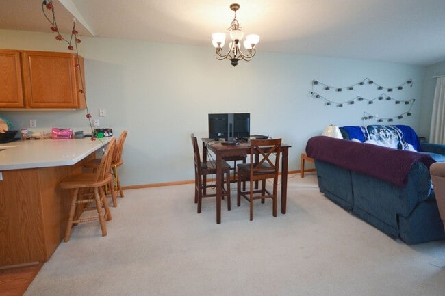 Building Photo - One level living in this end unit townhome!