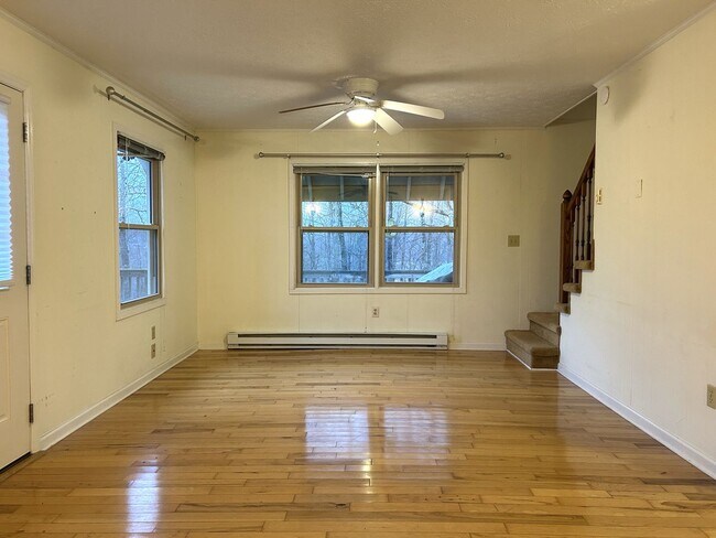 Building Photo - Light-Filled 3BR Home with Wraparound Deck, Convenient to Town