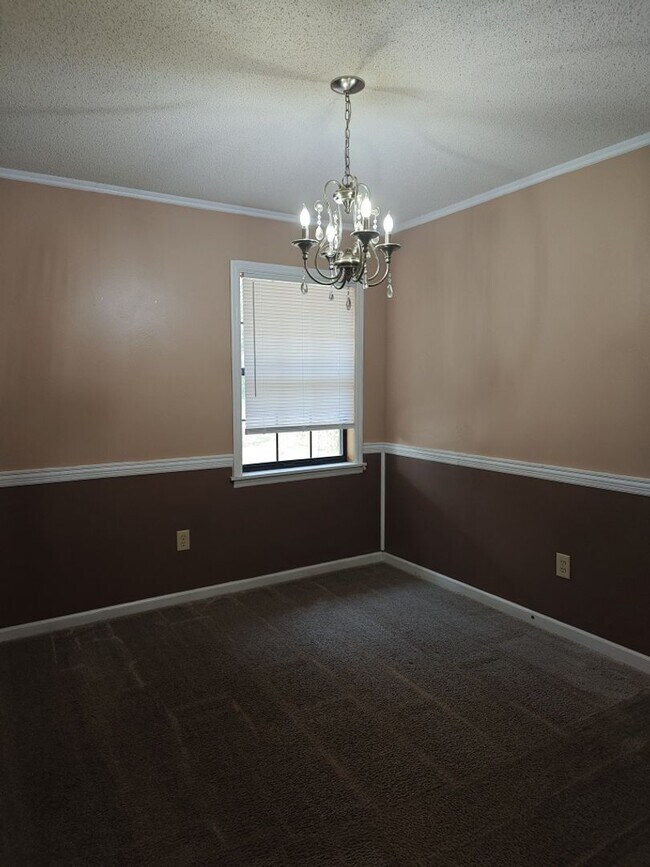 Building Photo - Elegant & Spacious 3-Bedroom Brick Home with Private Garage