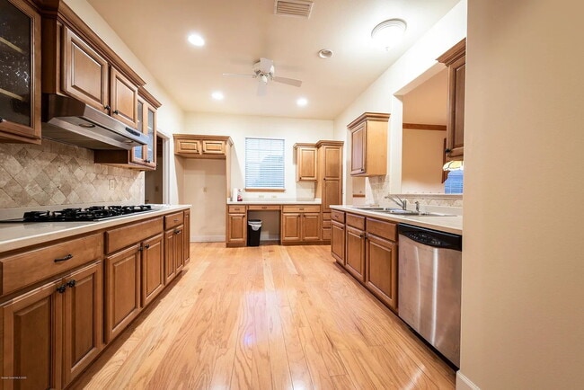 Building Photo - Spacious 4 bedroom house with 2.5 baths in desirable gated LaCita neighborhood