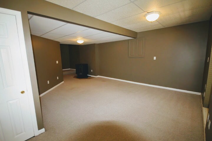 In-Law Quarters-Like, Finished Basement with Pellet Stove - 9505 NW 86th Ter