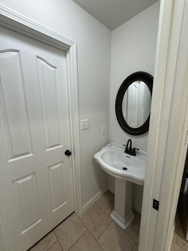 Building Photo - Spacious 3 BR with a fenced in backyard