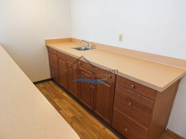 Building Photo - Spacious 4 Bedroom Home with Fenced Backyard & Garage