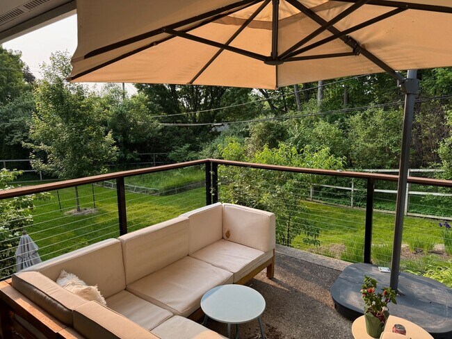 Building Photo - large modern home with big backyard, peace...