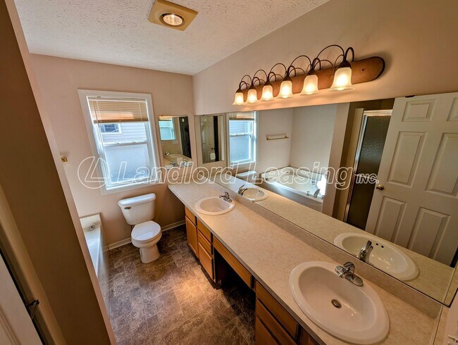 Building Photo - Avon Home with Vaulted Ceilings, Gas Firep...