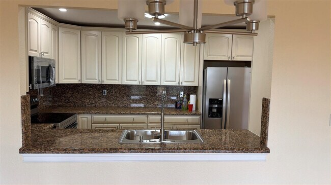 Building Photo - 10777 W Sample Rd