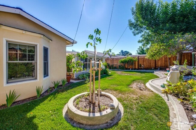 Building Photo - Turnkey Home with Natural Light & Upgrades...