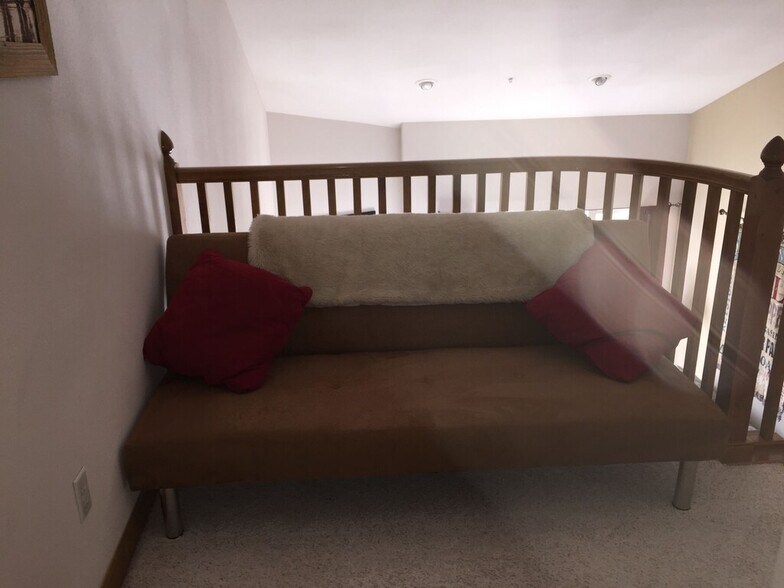futon bed in loft area - 103 Morningstar Cir