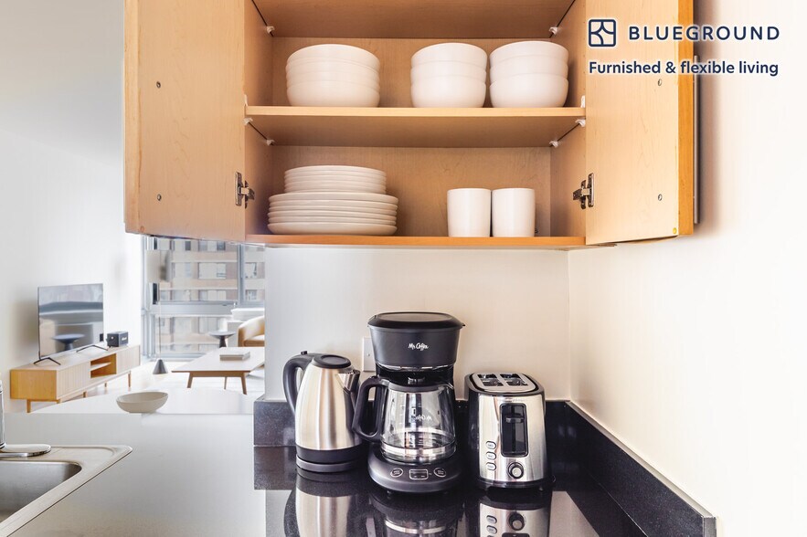 Building Photo - 4-75-75 48th Ave