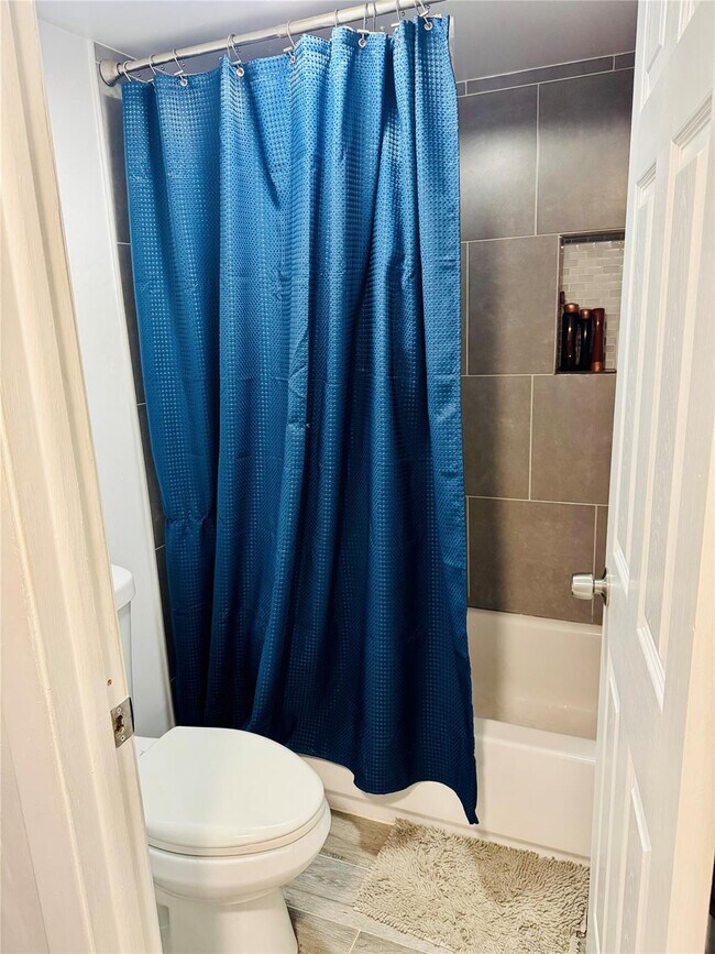 Building Photo - 7355 Woodmont Terrace